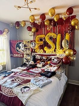 Florida State bed party with FSU balloon letters, gold and red balloons, and Seminoles merchandise