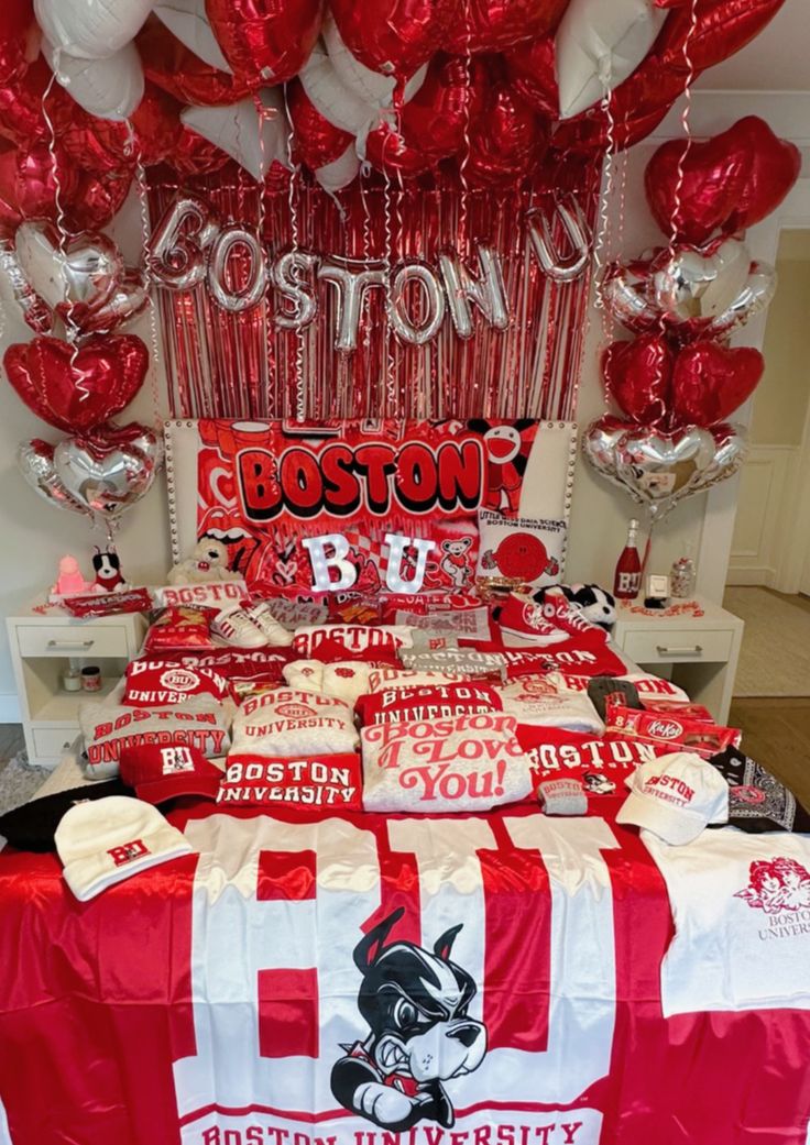 Boston University bed party setup with school spirit