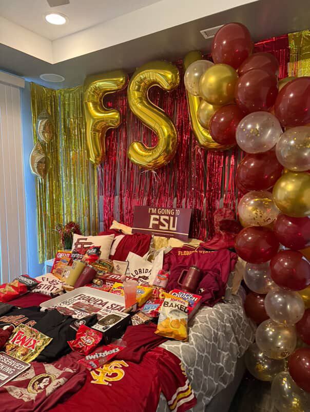 FSU bed party with decorations and merchandise