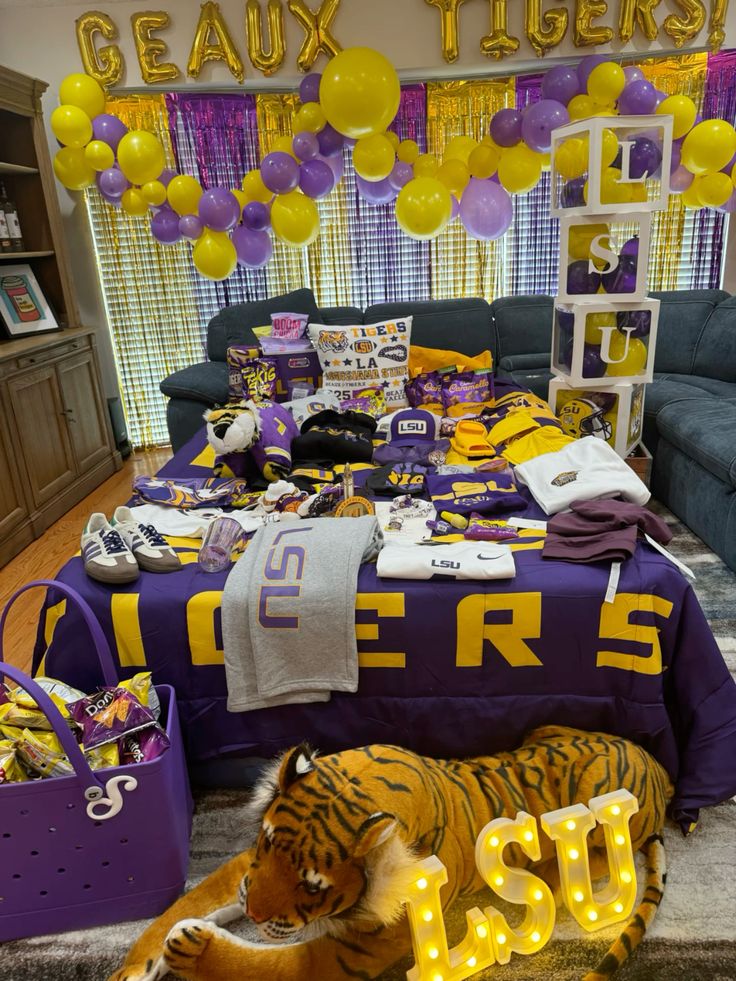 LSU Tigers bed party setup with purple and gold theme