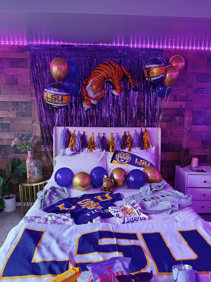 LSU Tigers bed party with purple and gold decorations and school spirit