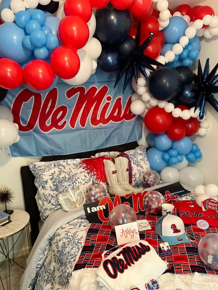 Ole Miss bed party with red and navy theme