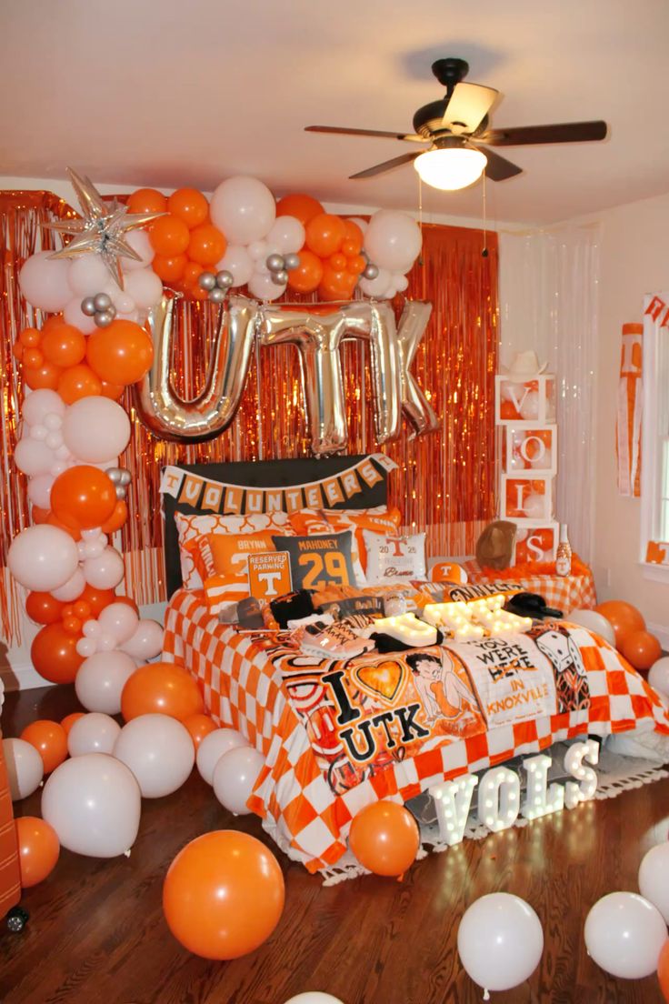 Tennessee Volunteers bed party with orange and white theme and school spirit decorations