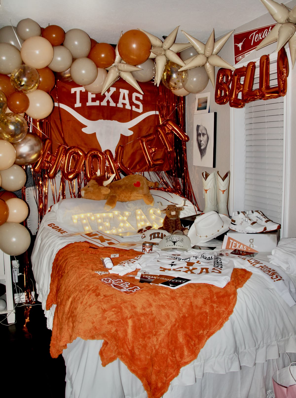 UT Austin bed party with orange and white theme
