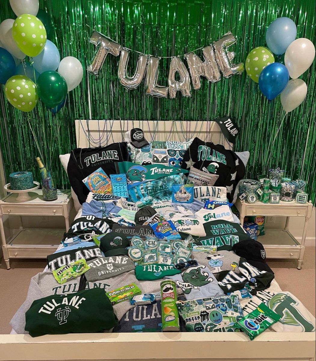 Tulane bed party with decorations and merchandise